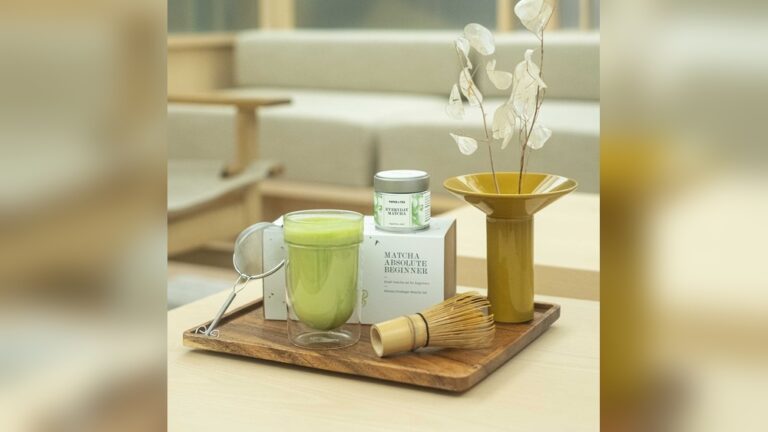 Matcha beginner tea set with whisk, matcha powder, and a prepared matcha latte.