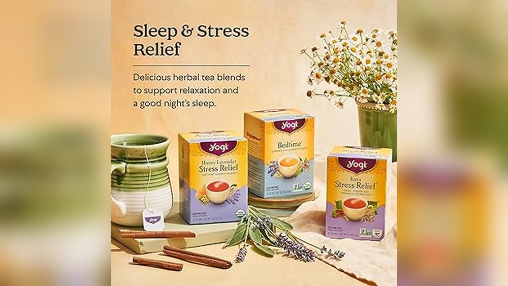 Yogi Sleep & Stress Relief tea boxes with mug, lavender, and cinnamon sticks.