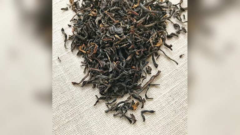 Pile of dark, twisted Earl Grey loose leaf tea