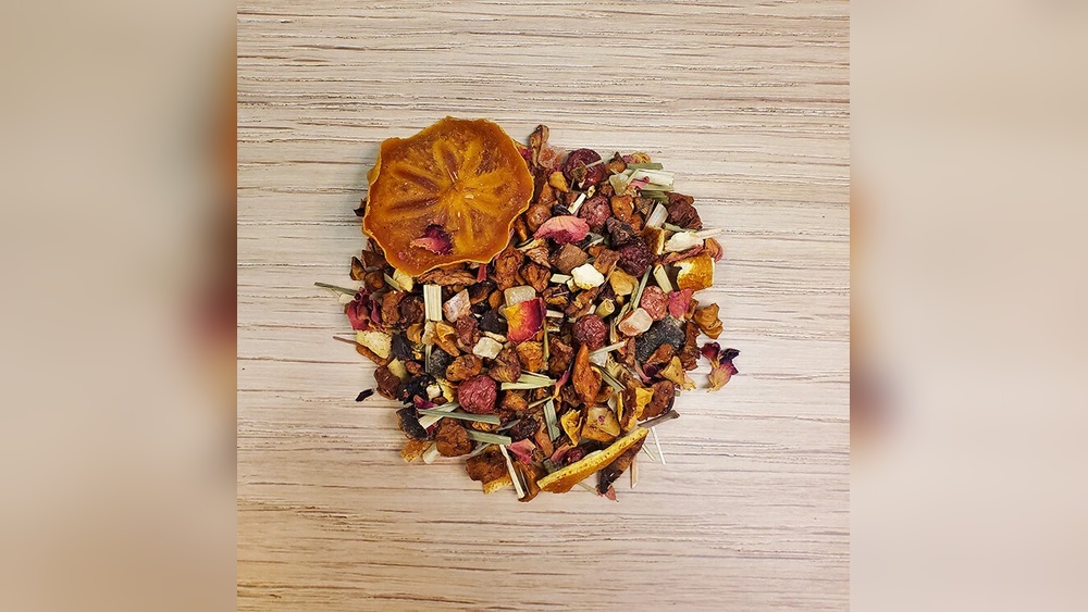 Fruit tea blend with dried persimmon, rose petals, and citrus peel