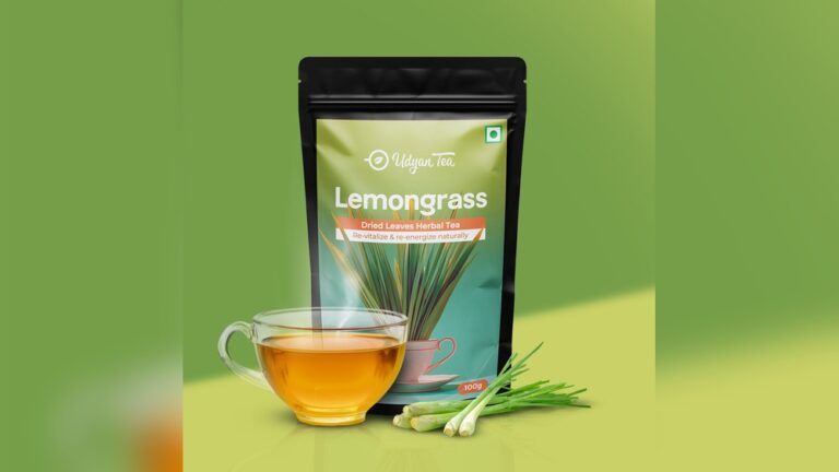 Udyan Tea Lemongrass Herbal Tea pouch with a cup of tea and fresh lemongrass stalks.