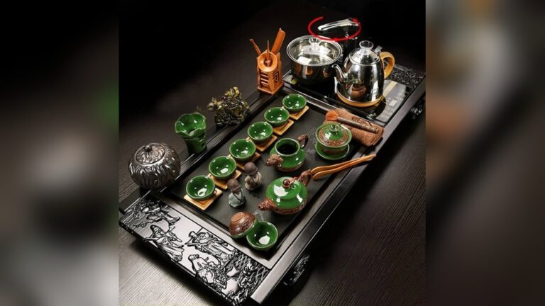 Elegant Chinese Kung Fu tea set with ceramic teapot, cups, and tray