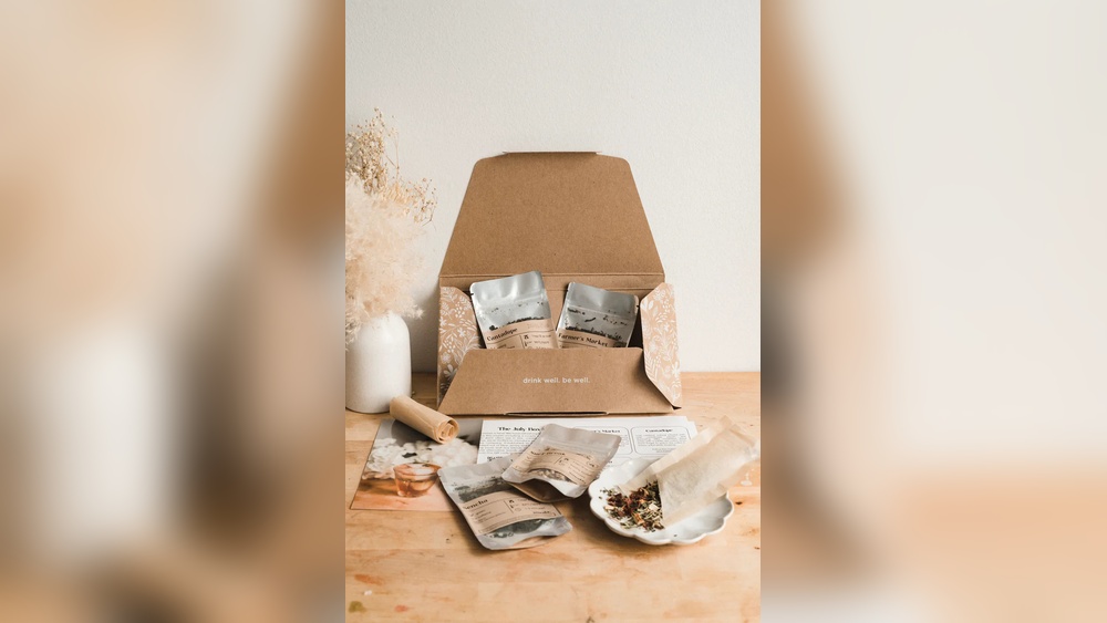 Tea subscription box with sample pouches and dried flowers