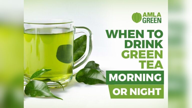 Amla Green tea in a glass mug with fresh leaves. When to drink green tea: Morning or Night.