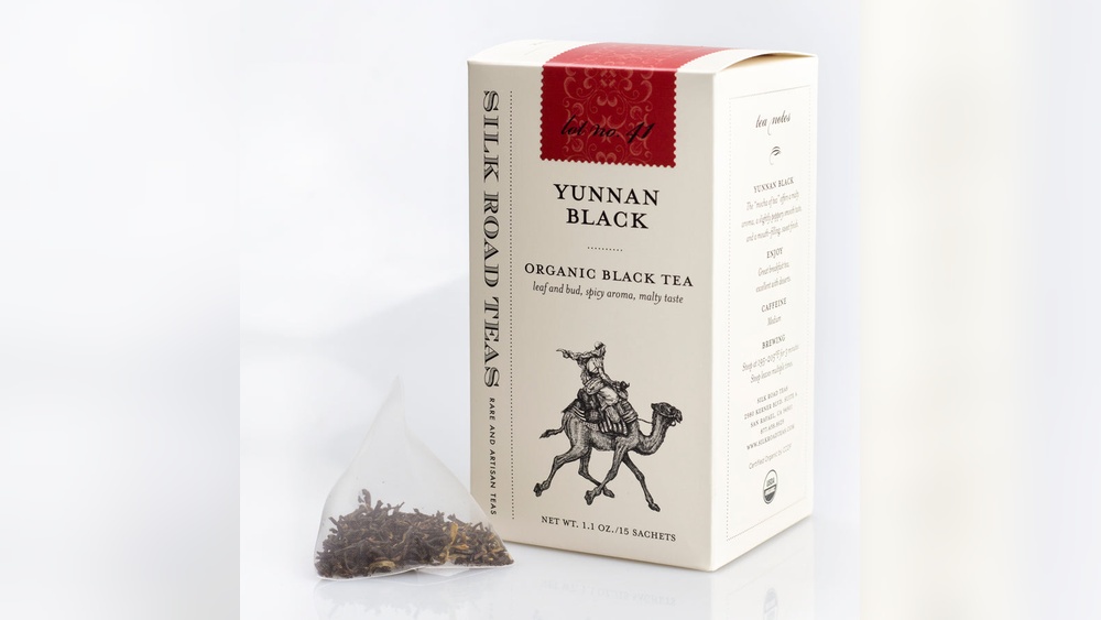 Yunnan Black Tea box and sachet with camel illustration